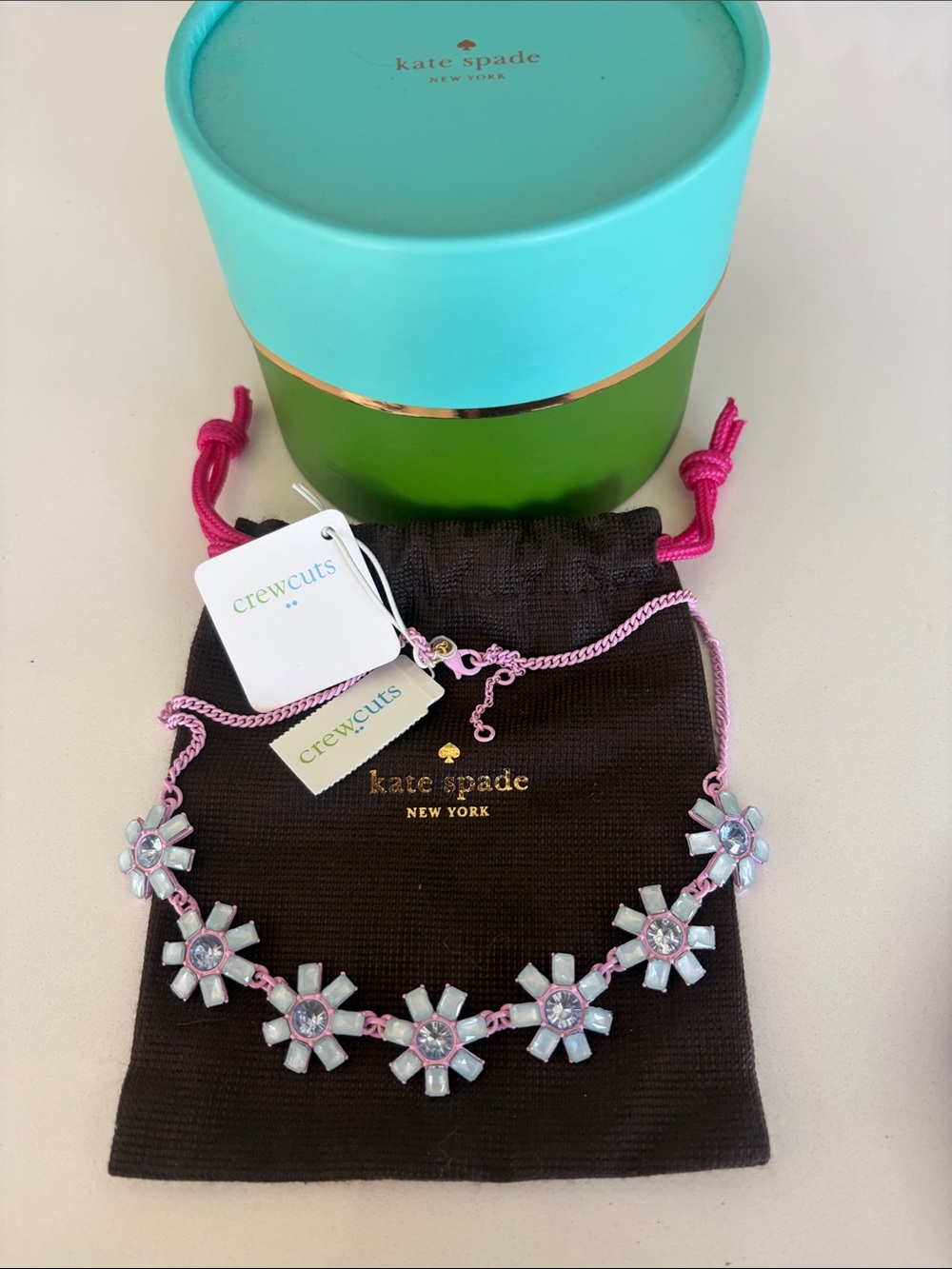 kate spade pink chain charm necklace with gold logo detail